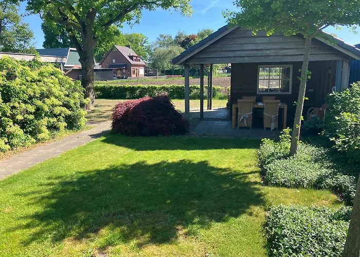 Klassiek veluws huis onder de beuken
